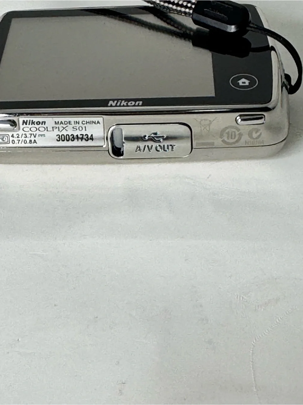 Nikon COOLPIX Silver Point-and-Shoot Camera with Black Case with charger cable